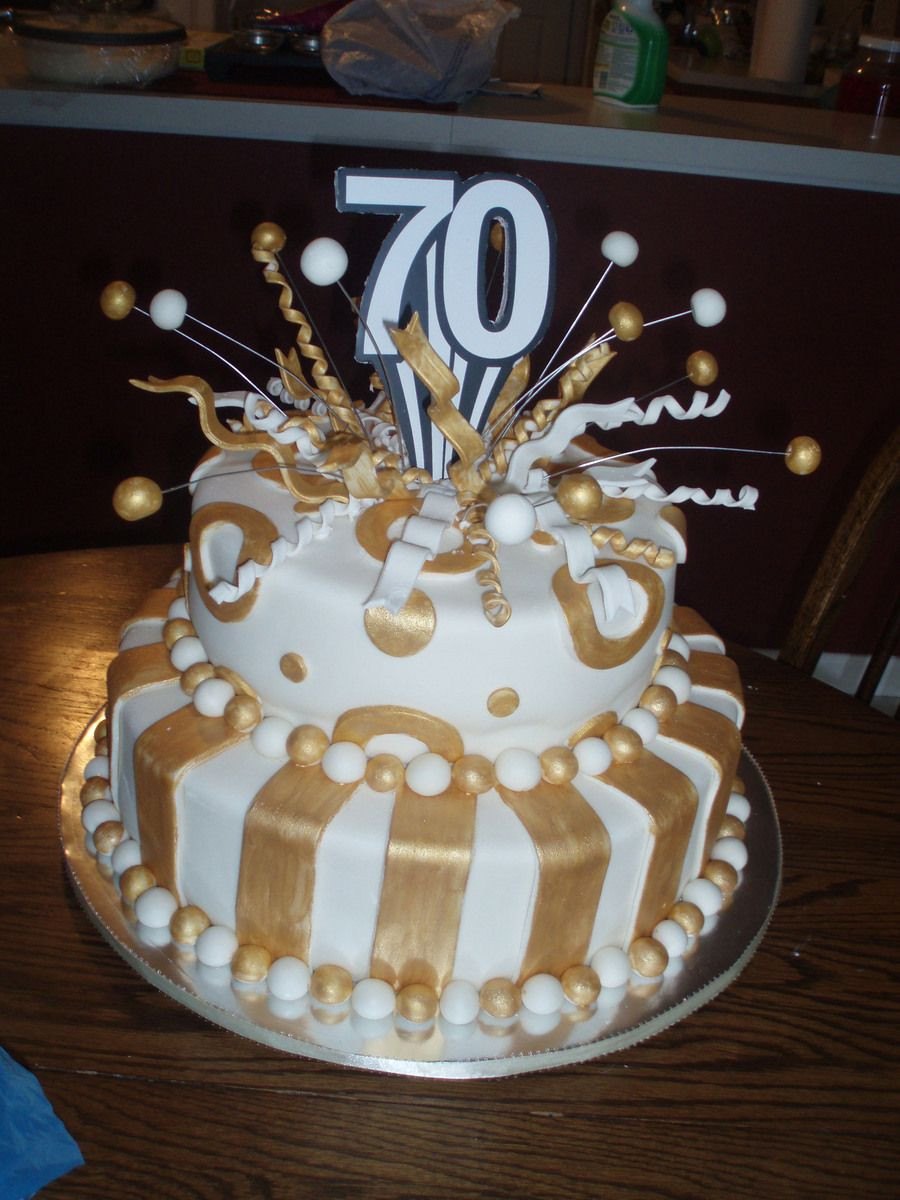 70Th Birthday Cake
 70Th Birthday Cake fondant covered white cakeplease let me