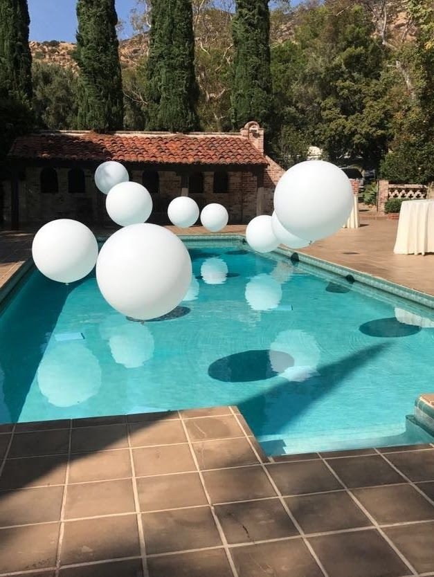 Baby Shower Pool Party Ideas
 Jumbo balloons over this pool create a magical look for
