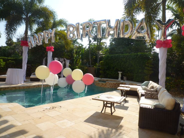 Backyard Party Decor Ideas
 Birthday balloon arch over a swimming pool Backyard party