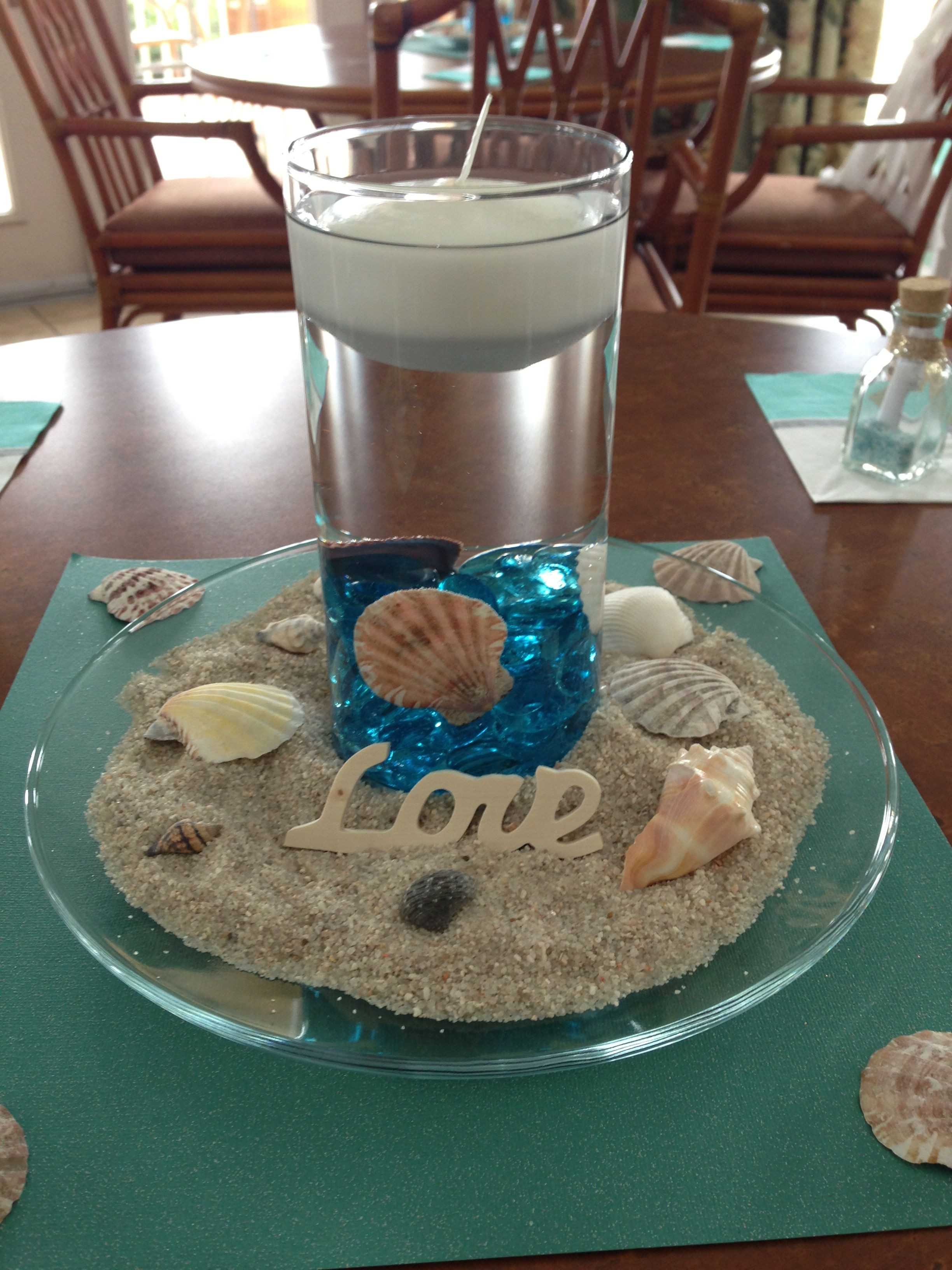 Centerpiece Ideas For Beach Theme Party
 Roxie we can totally use those vases for this idea
