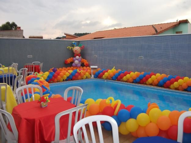 Cheap Pool Party Ideas
 Colorful balloon garland to decorate the pool for a kids
