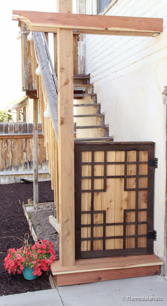 DIY Dog Gates
 Free Plans DIY Barn Door Baby Gate for Stairs