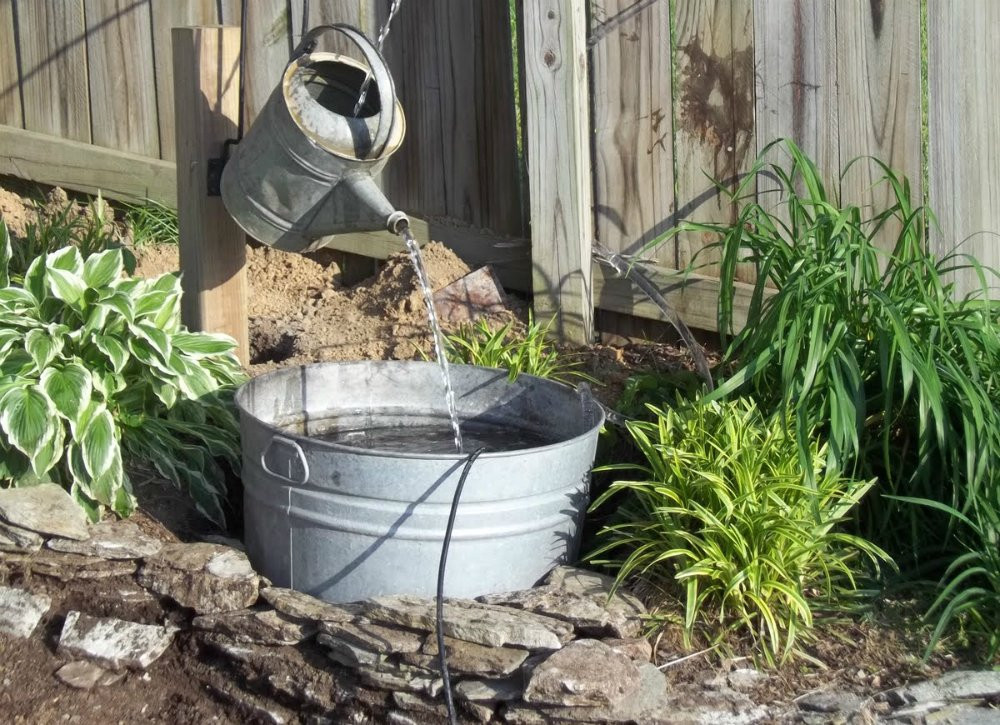 DIY Outdoor Fountain
 Vintage Watering Can DIY Fountain Ideas 10 Creative