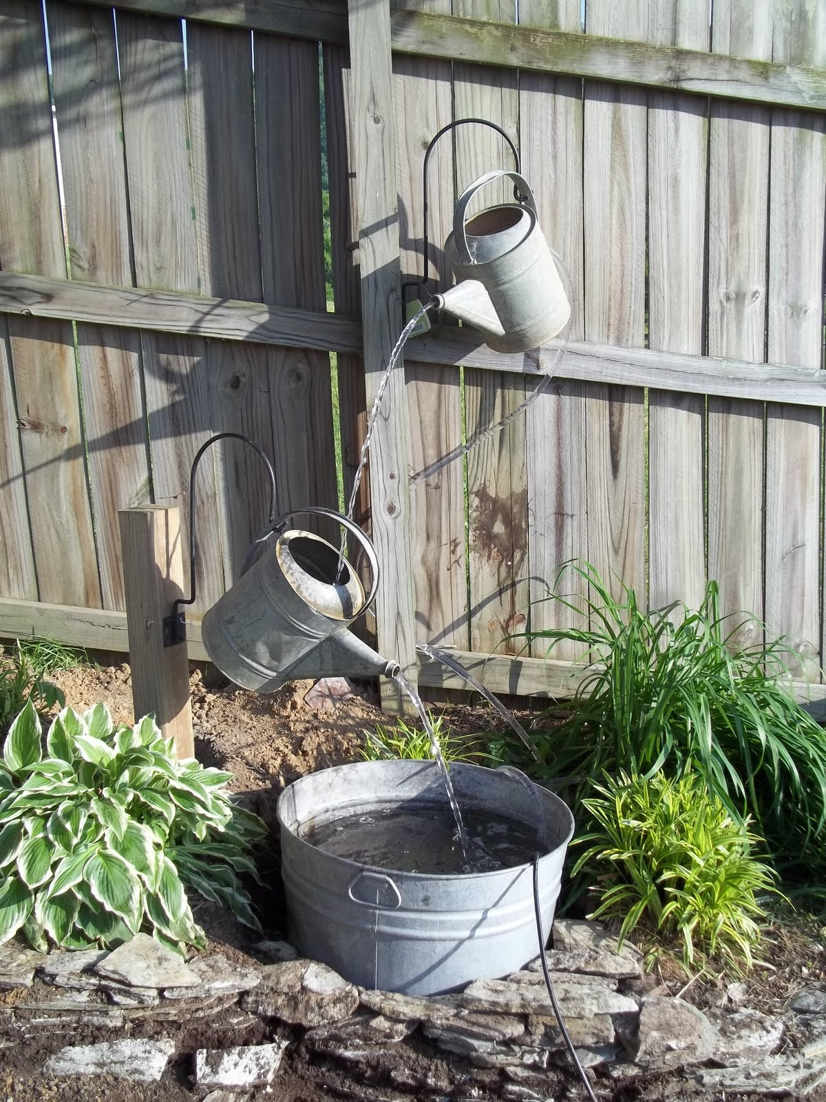 DIY Outdoor Water Fountain
 18 Great DIY Water Features For Your Garden Style Motivation