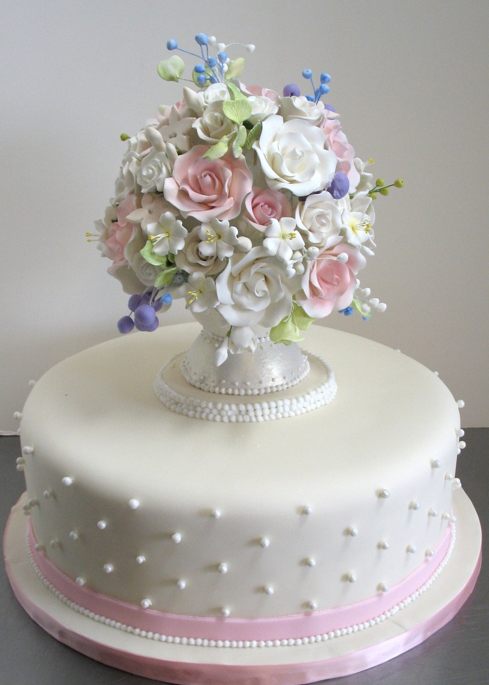 Fancy Birthday Cake
 White cake with sugar vase