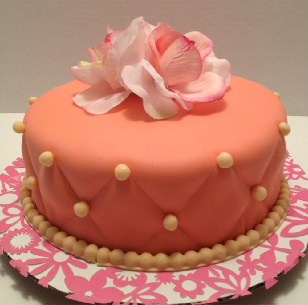 Fancy Birthday Cake
 Fancy birthday cake Coral and cream colored Moist