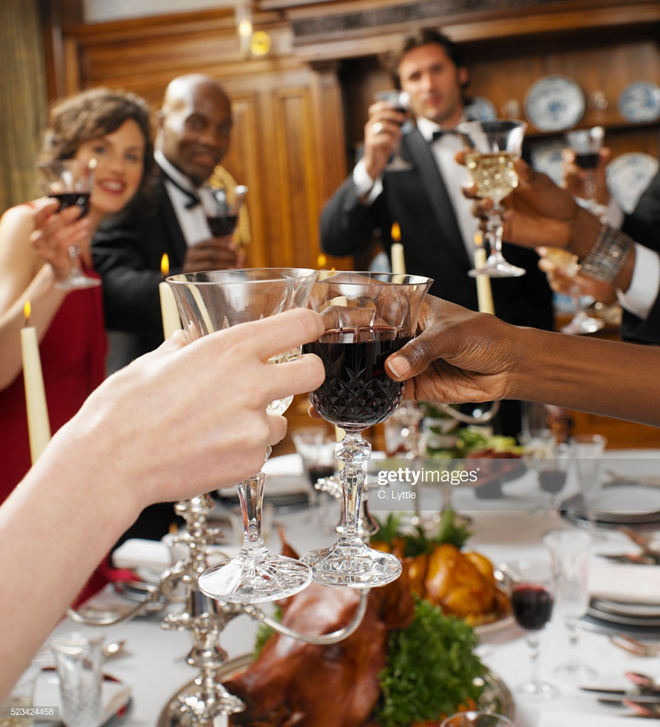 Formal Dinner Party Ideas
 Guests At Formal Dinner Party Making A Toast Stock