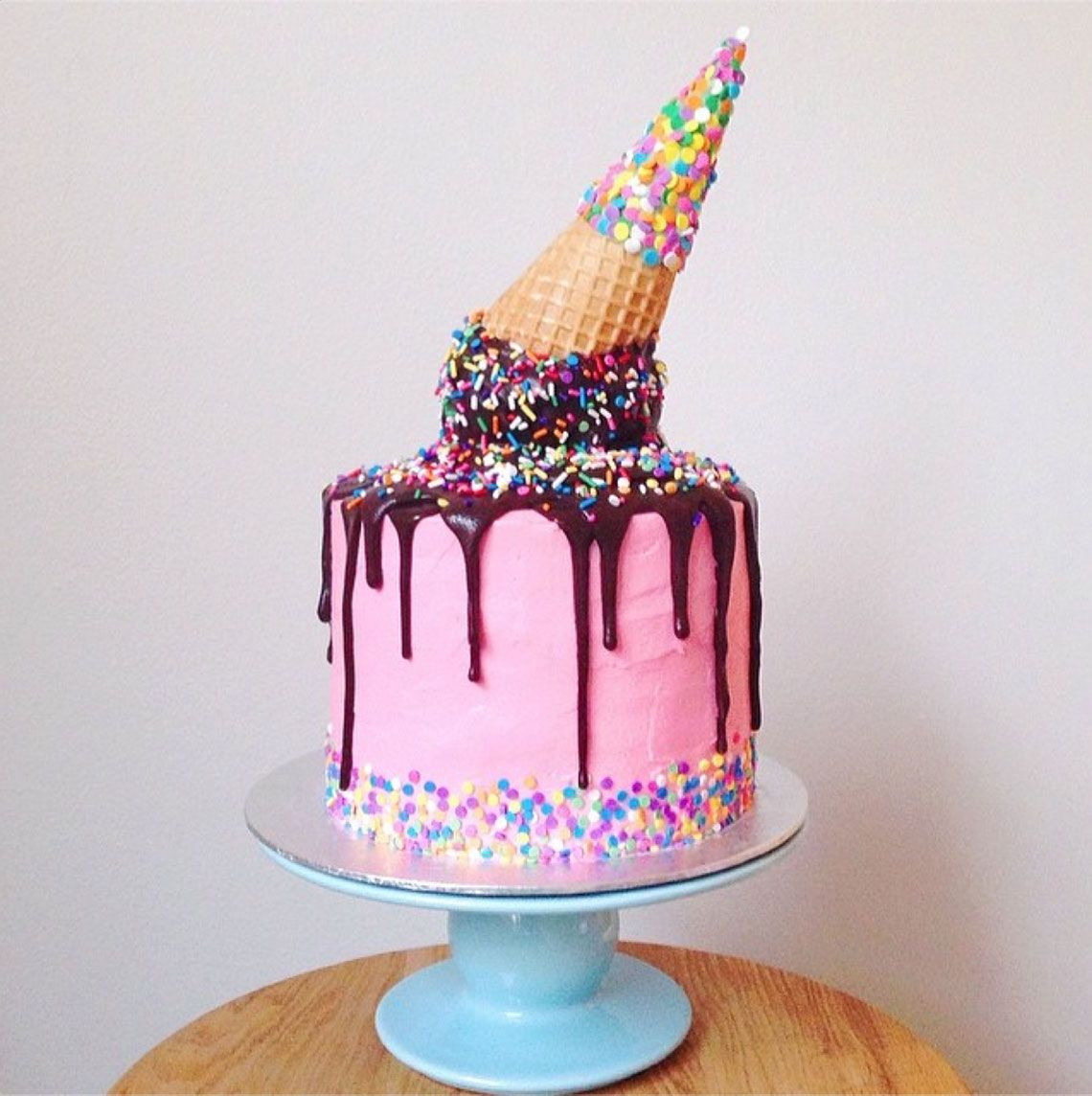 Ice Cream Birthday Cake
 How amazing is this melted ice cream cone cake by Sugar