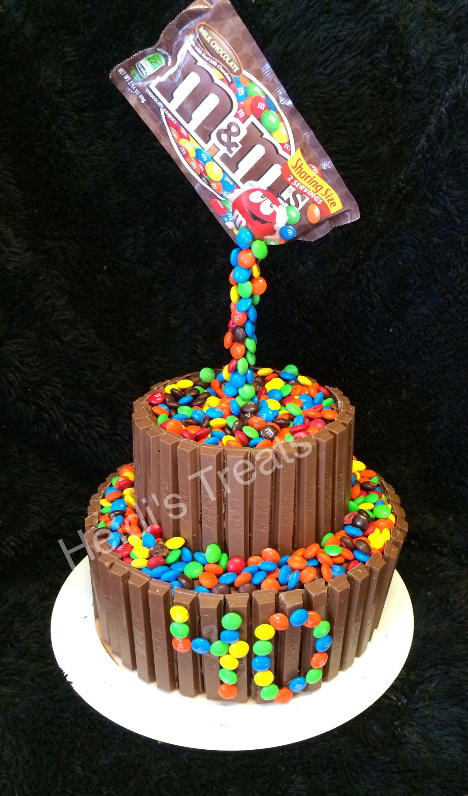 M&amp;Ms Birthday Cake
 Floating candy cake M & Ms and kit Kat cake 40 forty