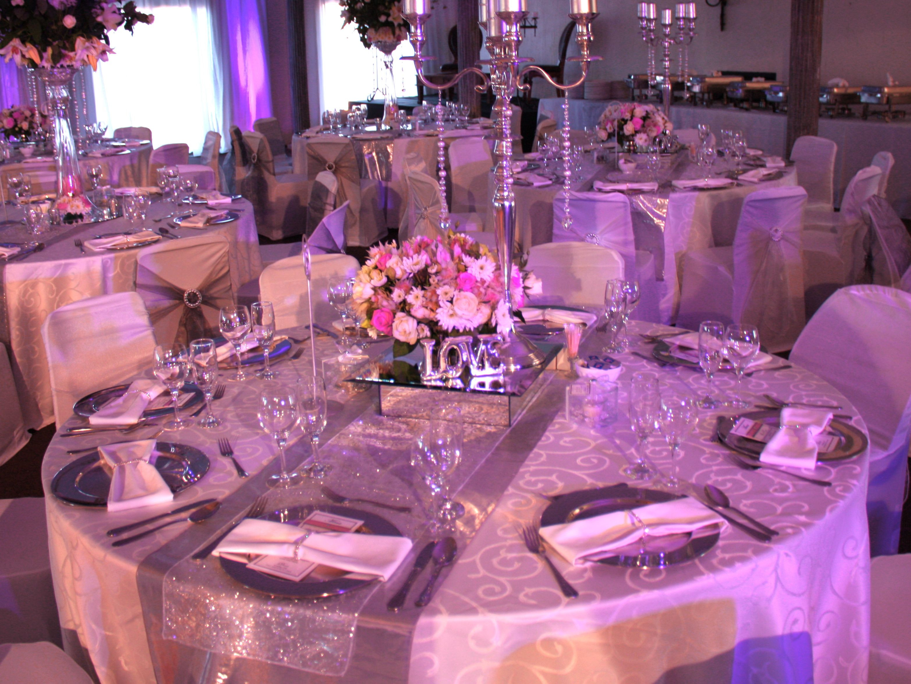 Purple And Silver Birthday Decorations
 The effect of a light purple and silver lighting for table