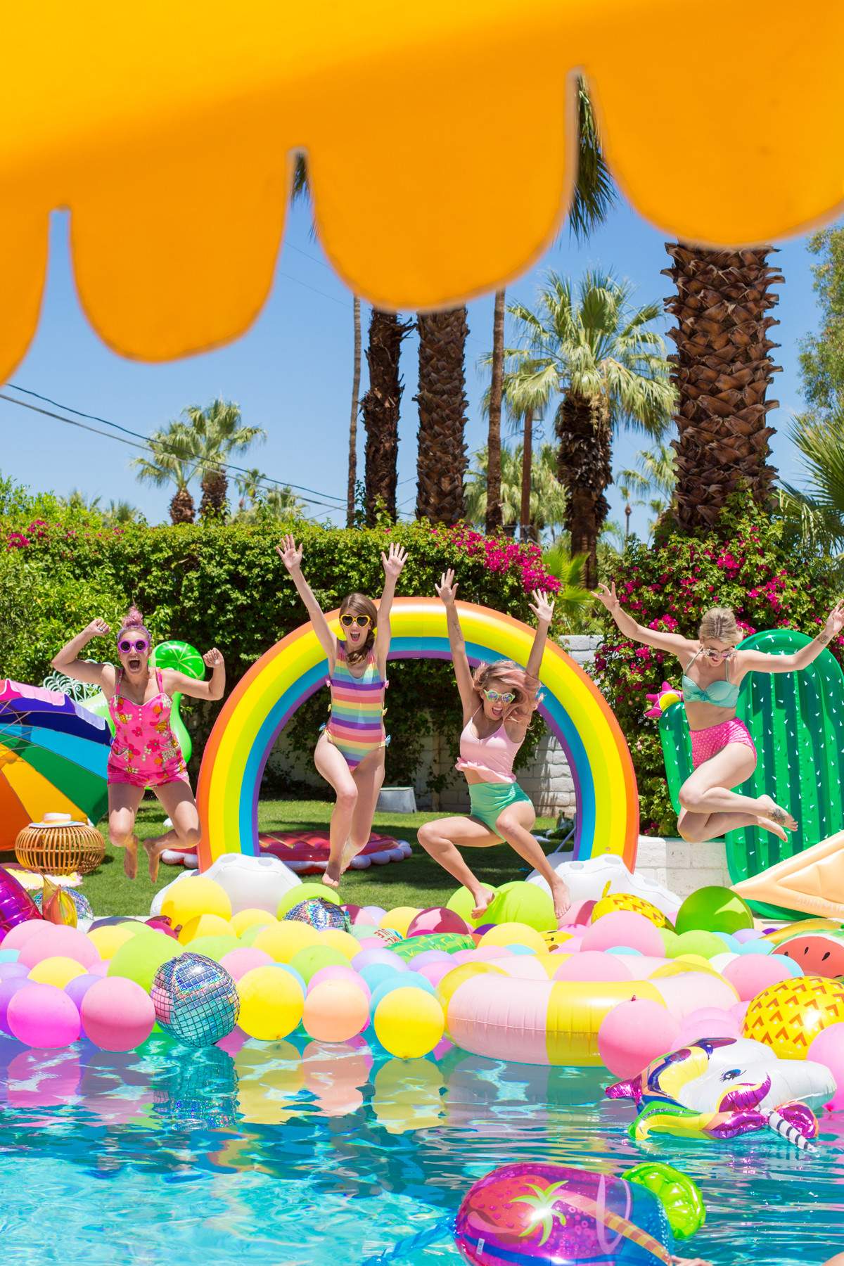 Swimming Pool Party Ideas
 An Epic Rainbow Balloon Pool Party Studio DIY