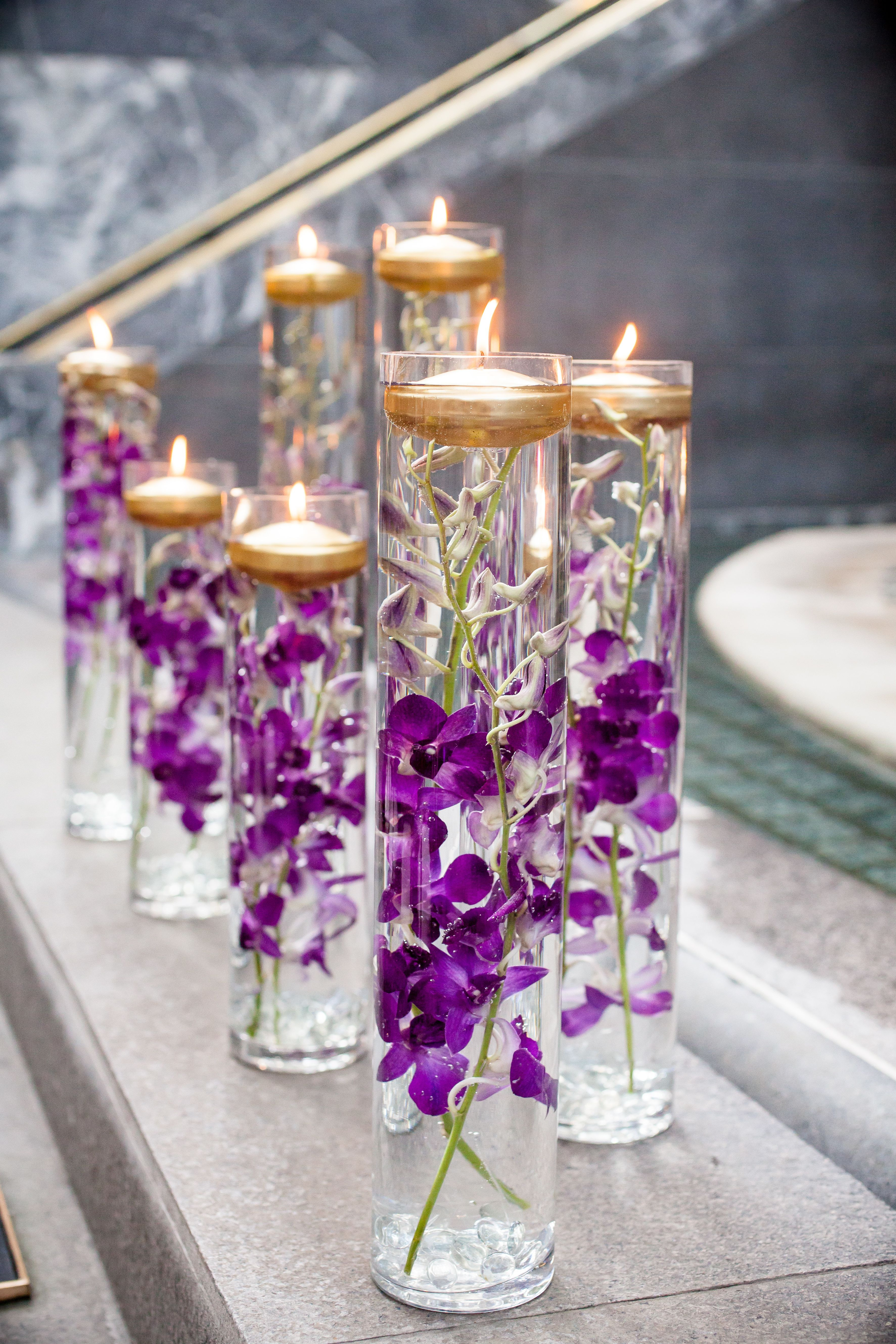 Wedding Engagement Party Ideas
 Glass Vases With Purple Orchids and Floating Candles