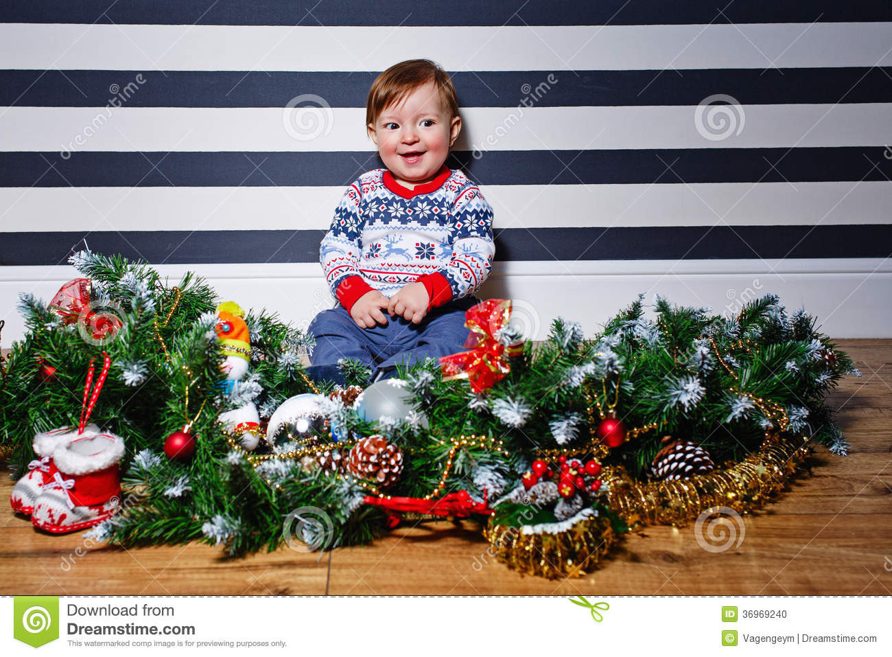 Christmas Floor Decorations
 Little Boy And Christmas Stock Image