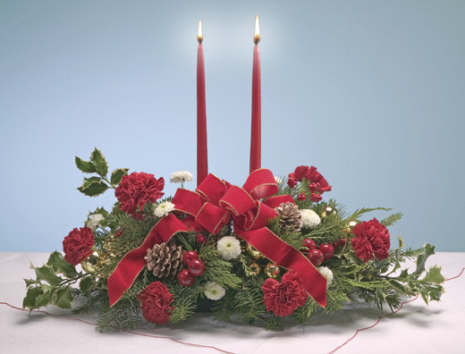 Christmas Flower Name
 Yuletide Cheer Centerpiece Christmas Flower Delivery