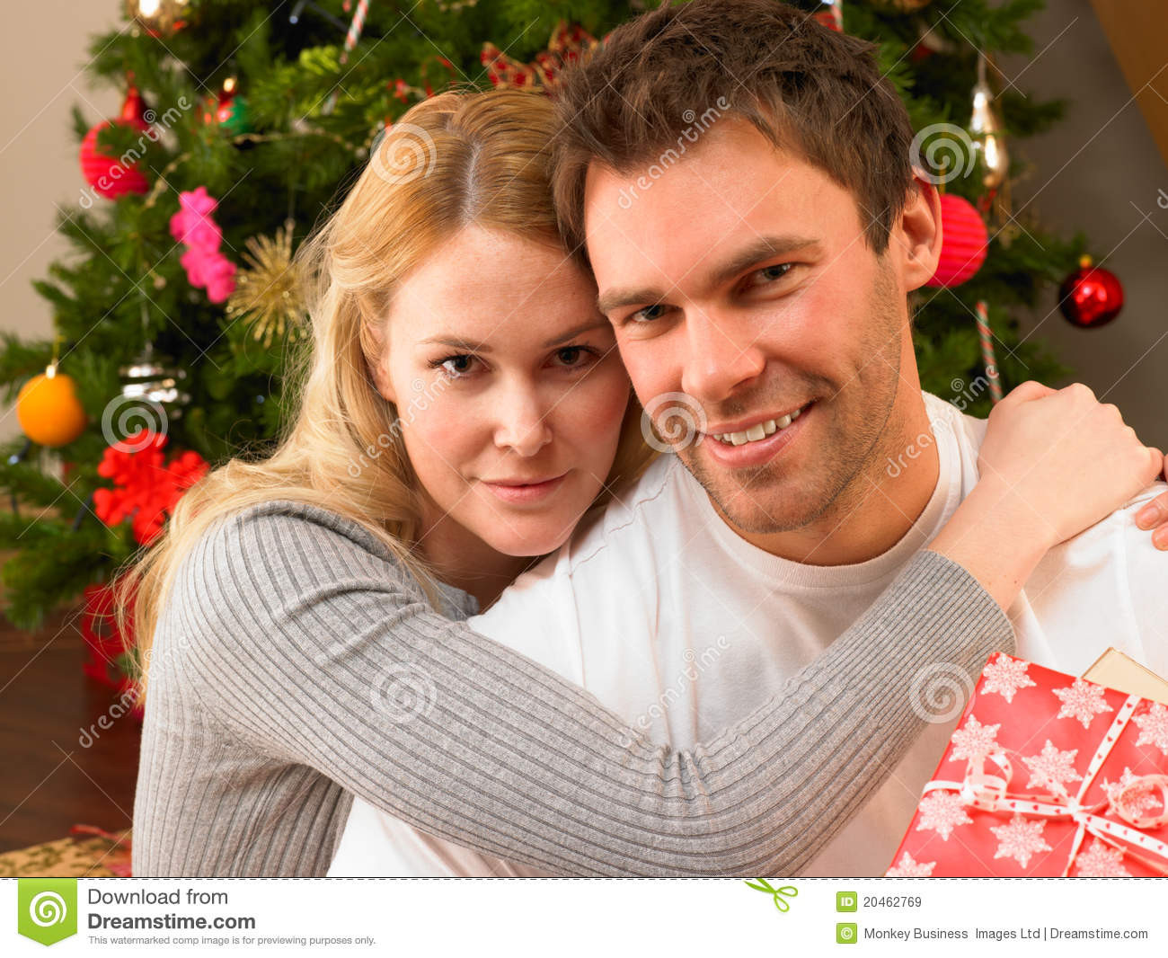 Christmas Gift Ideas For Young Couples
 Young Couple With Gifts In Front Christmas Tree Stock