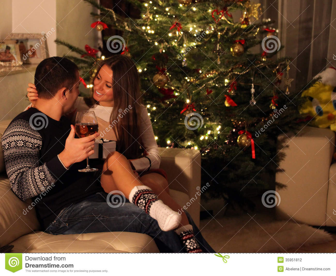 Christmas Gift Ideas For Young Couples
 Young Couple With Gifts In Front Christmas Tree Stock