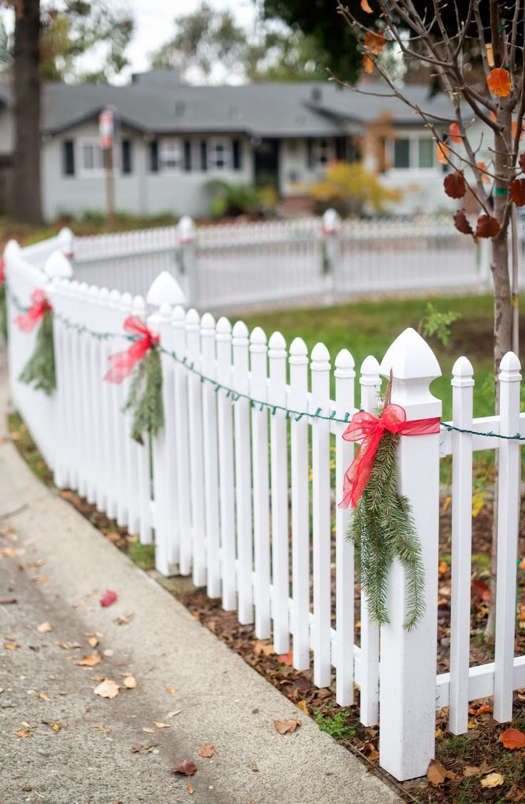 Christmas Lights On Fence Ideas
 31 best Christmas decorations on Fences images on