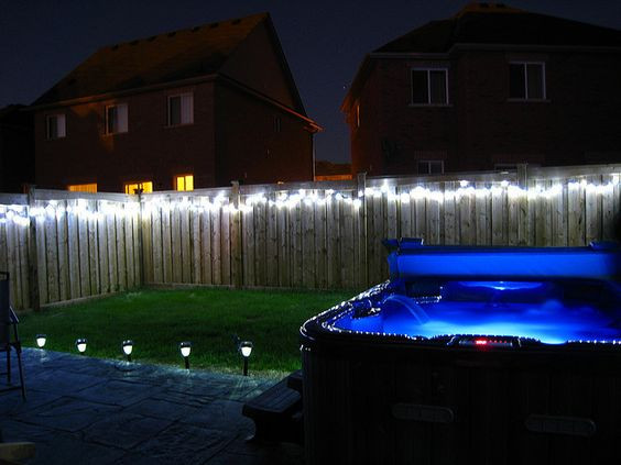 Christmas Lights On Fence Ideas
 String lights along your fence for backyard lighting is