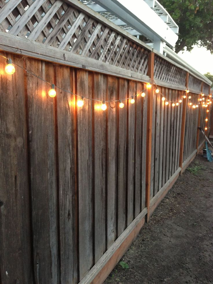 Christmas Lights On Fence Ideas
 DIY backyard lighting Hang lights on your fence
