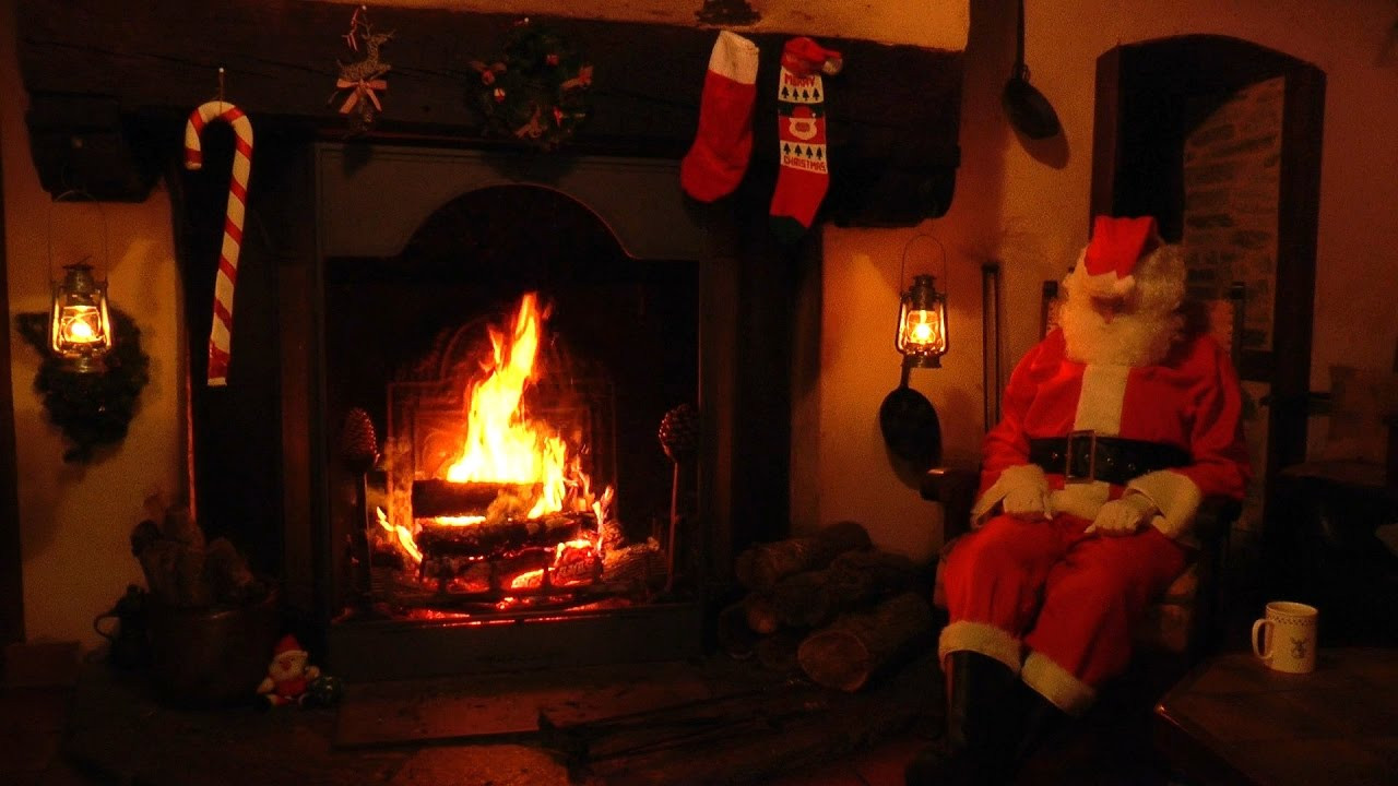 Christmas Music With Crackling Fireplace
 Crackling Fireplace Scene with Santa and Relaxing