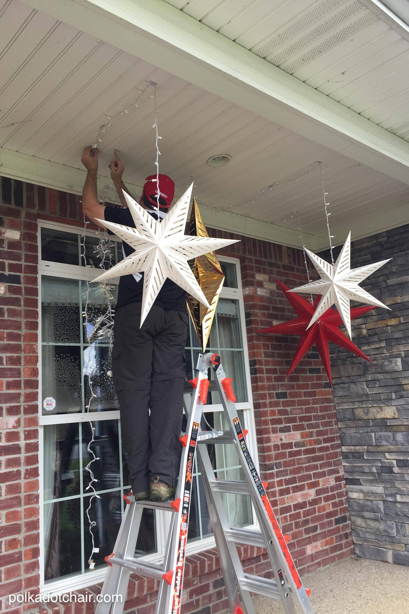 Christmas Porch Lights
 Hanging Star Lanterns a Christmas Front Porch Decorating