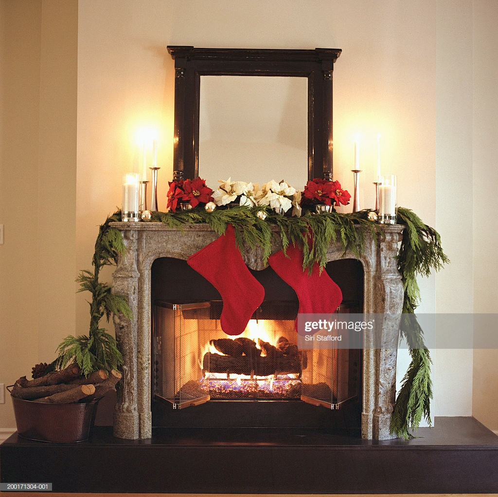 Christmas Sock Fireplace
 Fireplace Decorated With Christmas Stockings And