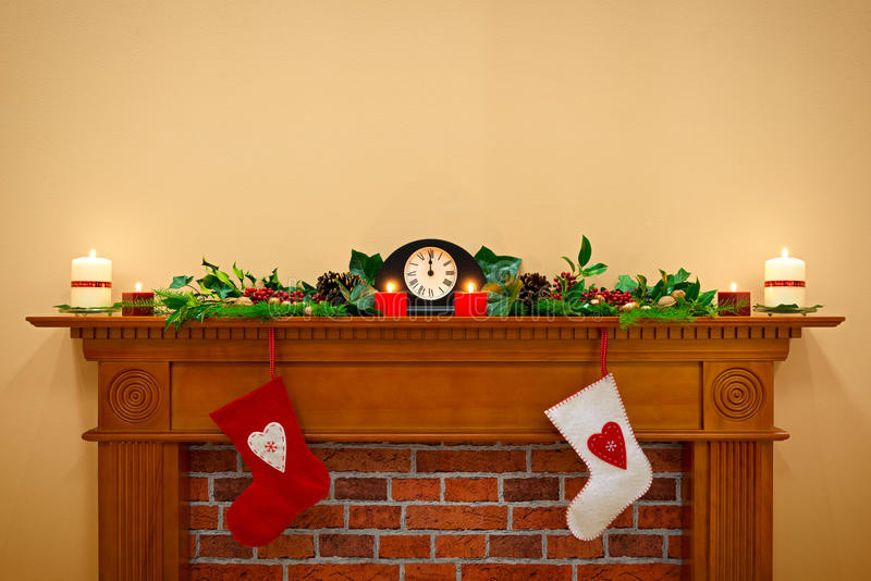 Christmas Stockings Hanging Over Fireplace
 Christmas Stockings And Garland A Mantlepiece Stock