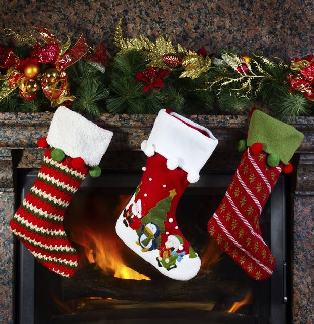 Christmas Stockings Hanging Over Fireplace
 An Ulster Log Stockings fall out of fashion at Christmas