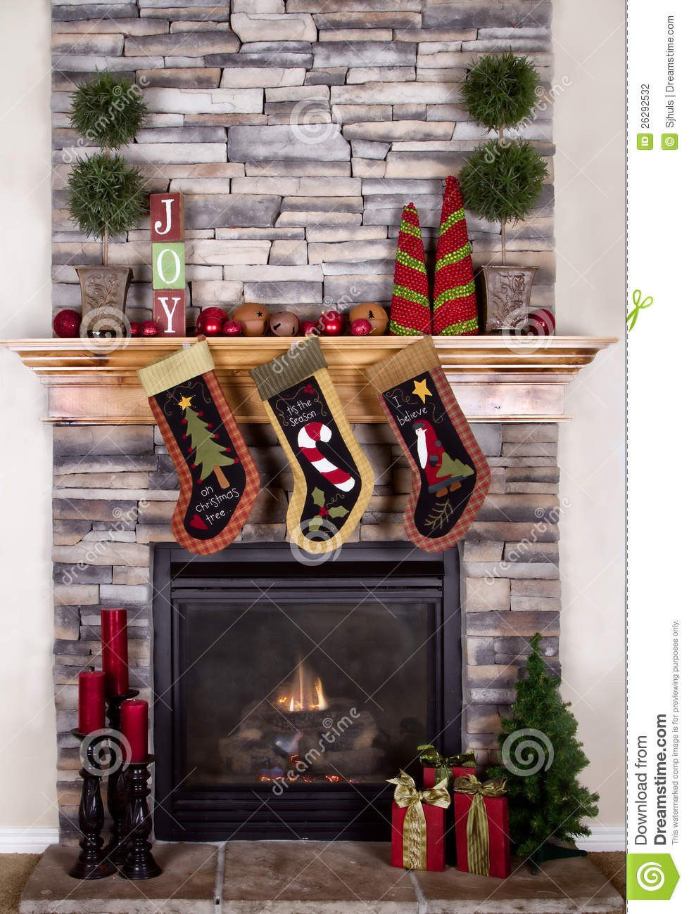 Christmas Stockings Hanging Over Fireplace
 Christmas Stockings Hanging From Fireplace Stock