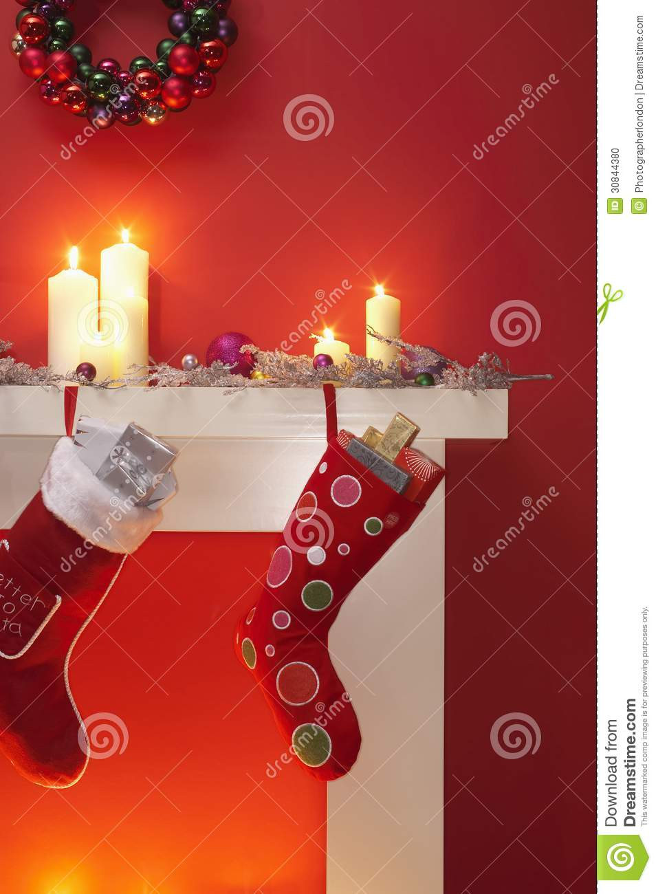 Christmas Stockings Hanging Over Fireplace
 Christmas Stockings Hanging Over Fireplace Stock