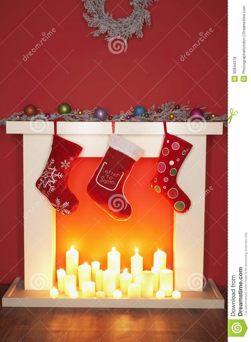 Christmas Stockings Hanging Over Fireplace
 Christmas Stockings Hanging Over Fireplace Stock
