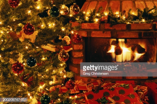 Christmas Tree Next To Fireplace
 Christmas Tree With Presents Next To Fireplace Closeup
