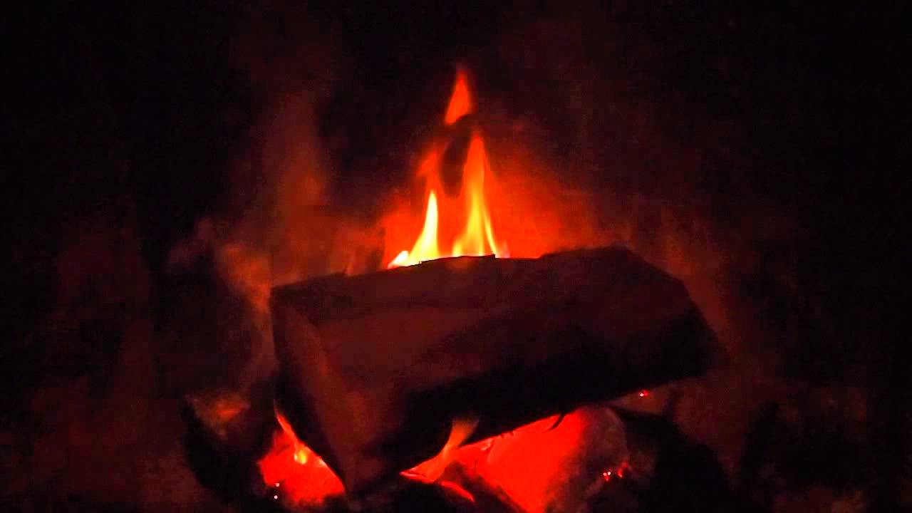 Crackling Fireplace With Christmas Music
 Crackling fire in fireplace with Christmas music