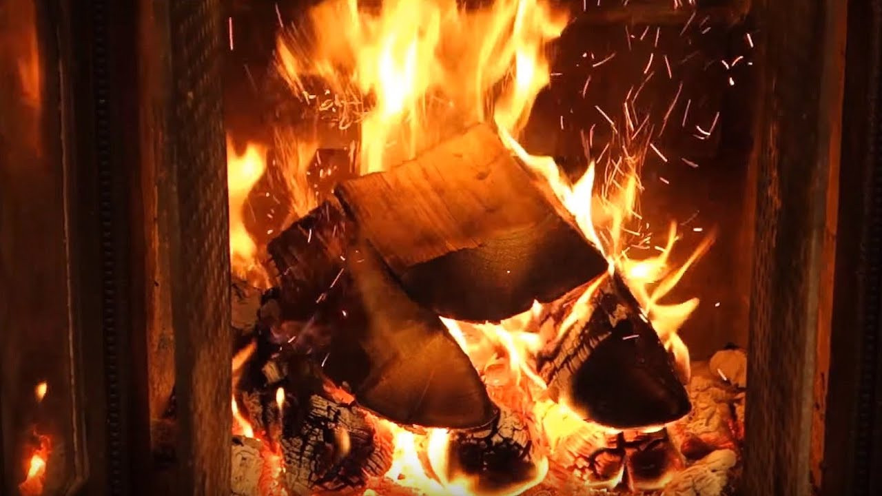 Crackling Fireplace With Christmas Music
 ficial Christmas Fireplace 🔥 2 HOURS Christmas Music