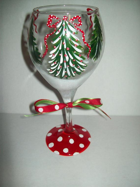 DIY Christmas Wine Glasses
 Christmas Tree wine glass by flybuttercreations on Etsy