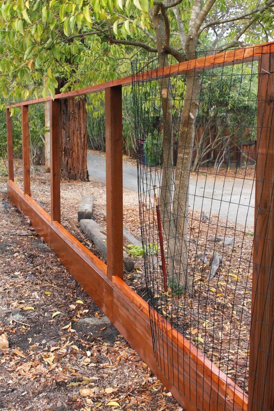 DIY Dog Fence
 Wood and Welded Wire Panel Fence