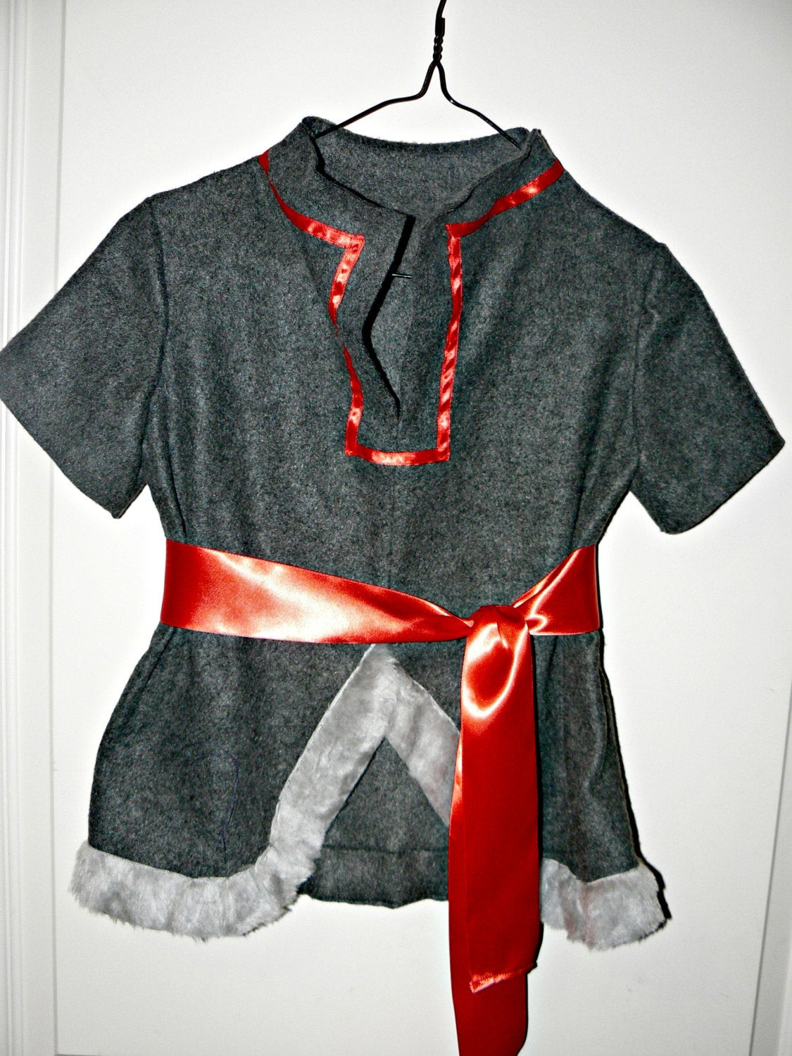 DIY Kristoff Costume
 Adult Kristoff inspired tunic costume with red sash by