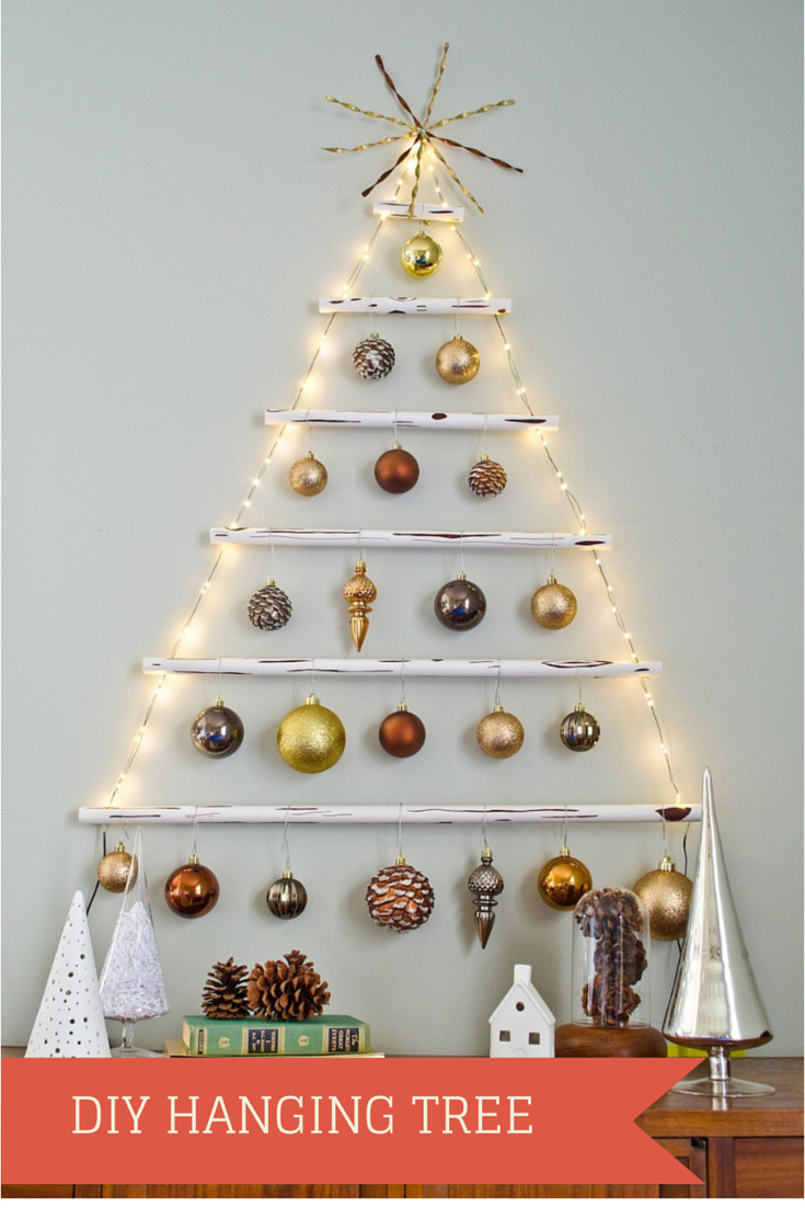 DIY Wall Christmas Trees
 How to Make a Faux Wood Hanging Christmas Tree A