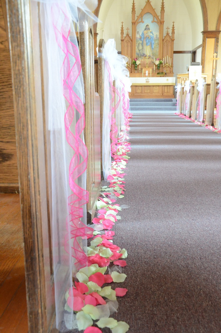 DIY Wedding Pew Decorations
 pew bows and petals along the aisle