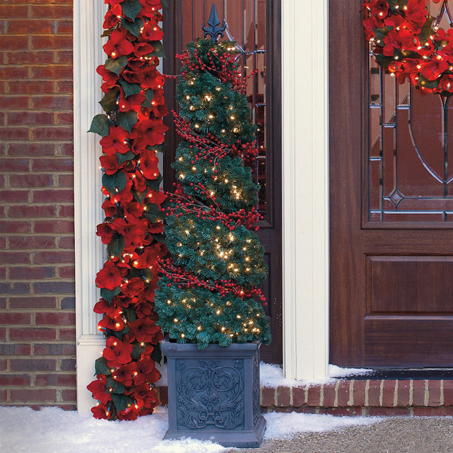 Front Gate Christmas
 Spiral Topiary Urn with Red Berry Lights 6 Frontgate