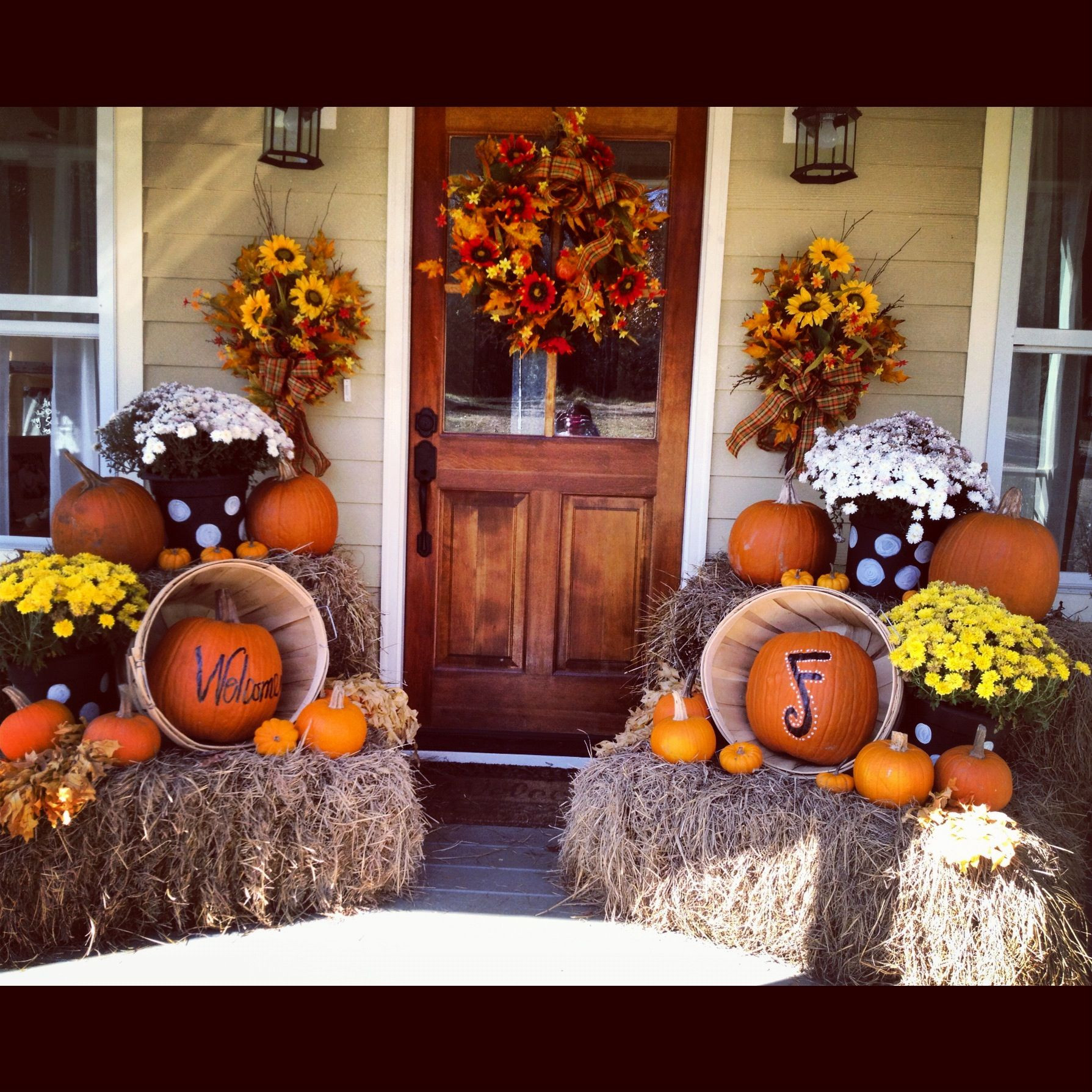 Front Porch Fall Decor
 Love the decorations but really love the front door