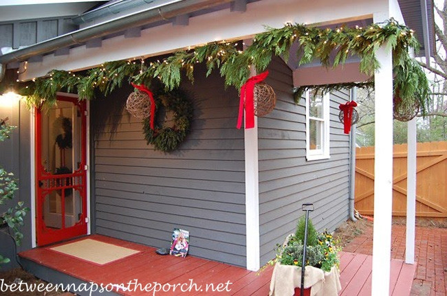 Front Porch Garland Christmas
 Christmas Decorating Ideas for Porches Doors and Windows