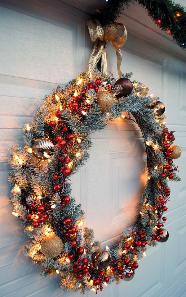 Garage Door Christmas Wrap
 Hang a large wreath on your garage door