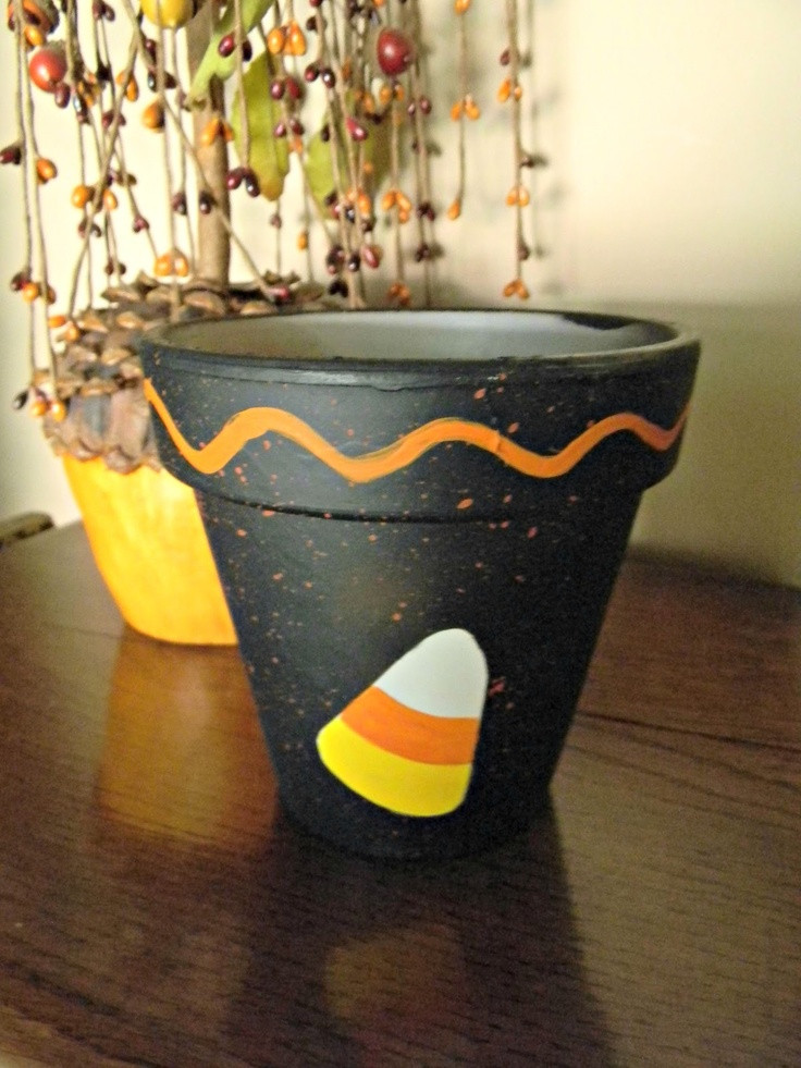 Halloween Flower Pots
 265 best Halloween Pot Crafts images on Pinterest