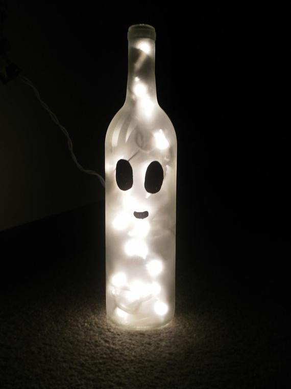 Halloween Lamp Post Cover
 Items similar to Ghost Wine Bottle Lamp on Etsy