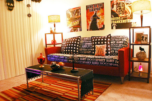 Halloween Living Room
 Use Tablecloth as Slipcover For Halloween Home Decorating