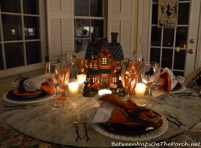 Halloween Table Settings
 Lit Halloween Table Setting With Spiderweb Tablecloth