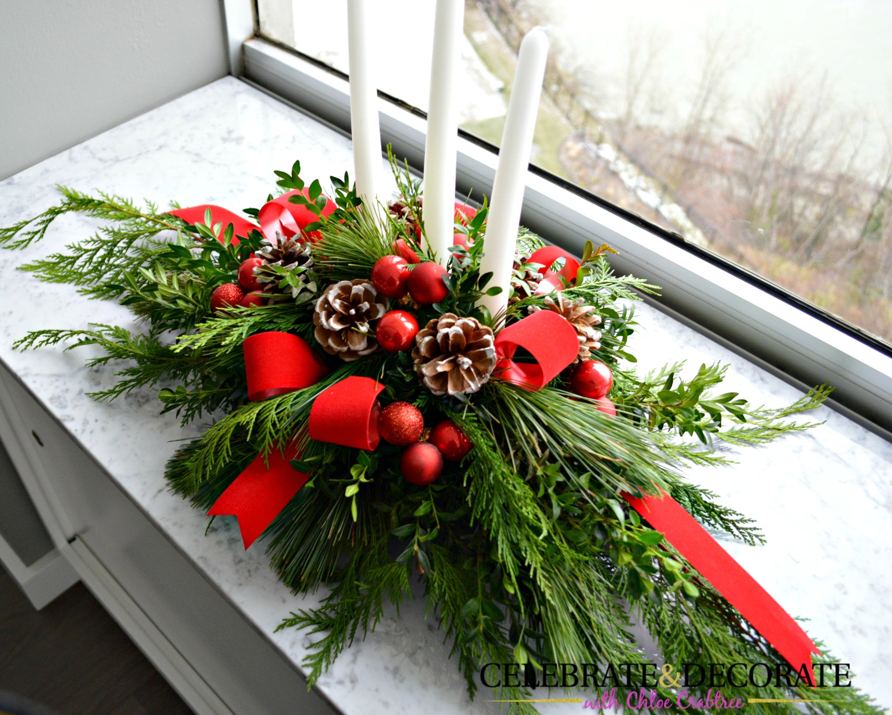 Homemade Christmas Flower Arrangements
 A Fall Centerpiece of Magnolia Leaves and Feathers