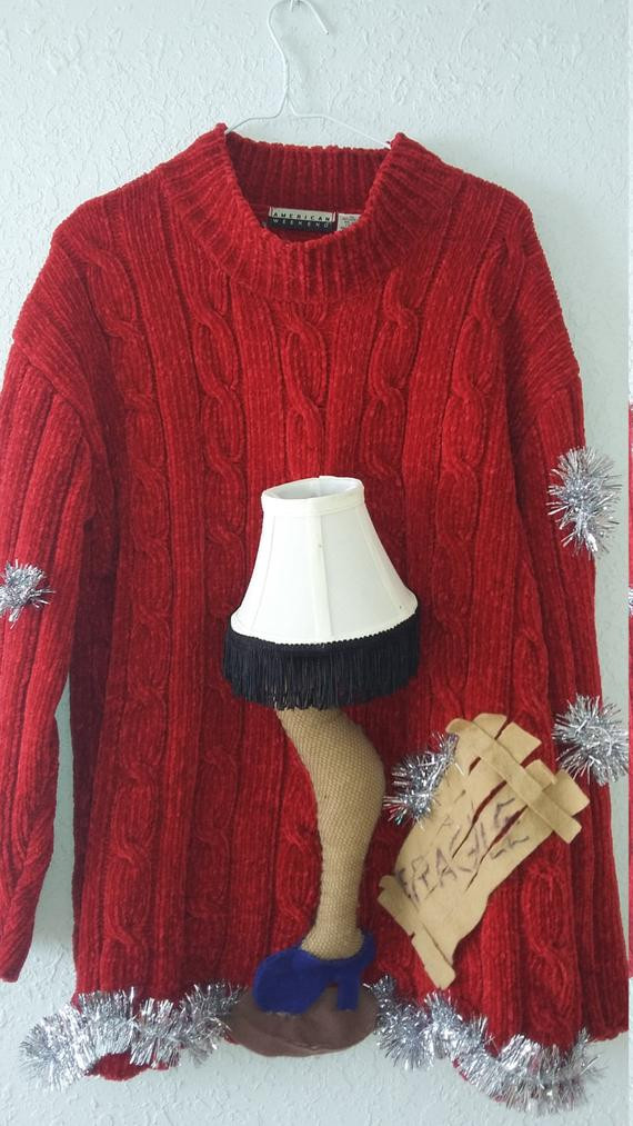 Leg Lamp Christmas Sweater
 Ugly Sweater with a Christmas Story leg lamp really lights up