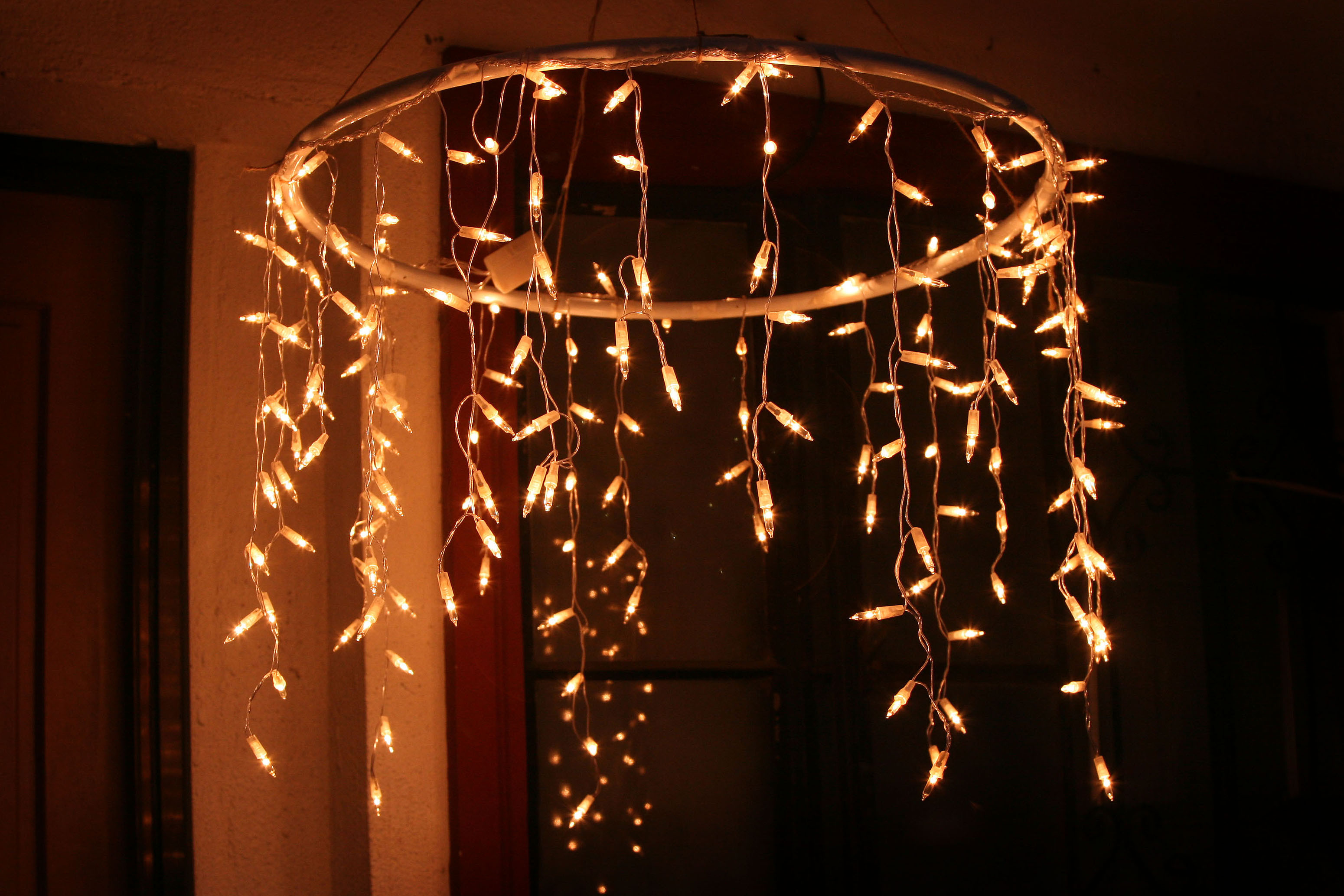 Porch Christmas Lights
 How to Make an Outdoor Chandelier with Icicle Christmas Lights